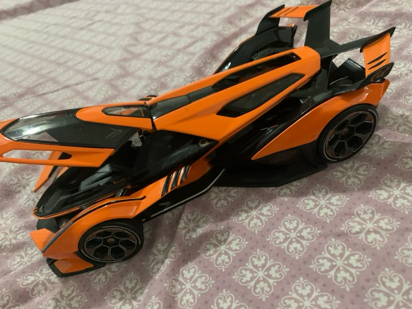 Orange and Black toy Car the seat of the car is kinda lose - photo 2