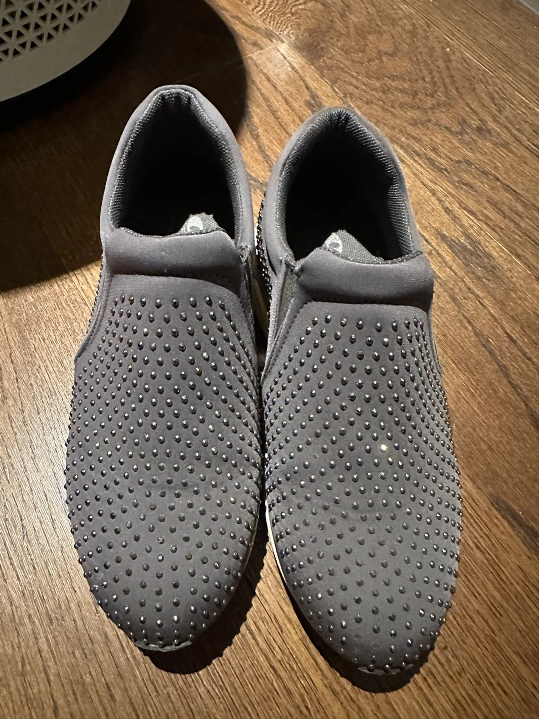 Grey slip-on sneakers with rhinestones