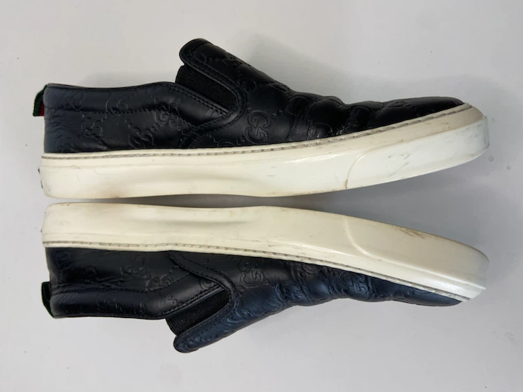 Gucci Black Leather Embossed Slip-On Sneakers - photo 2