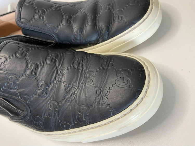 Gucci Black Leather Embossed Slip-On Sneakers - photo 3