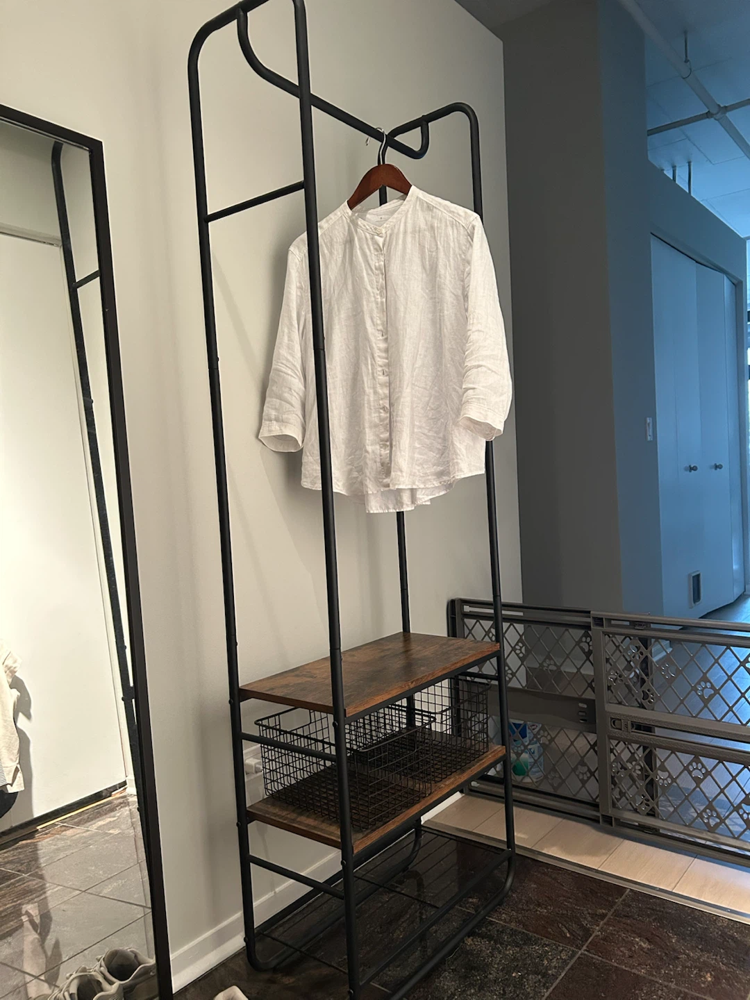 Industrial Style Garment Rack with Shelves and Baskets