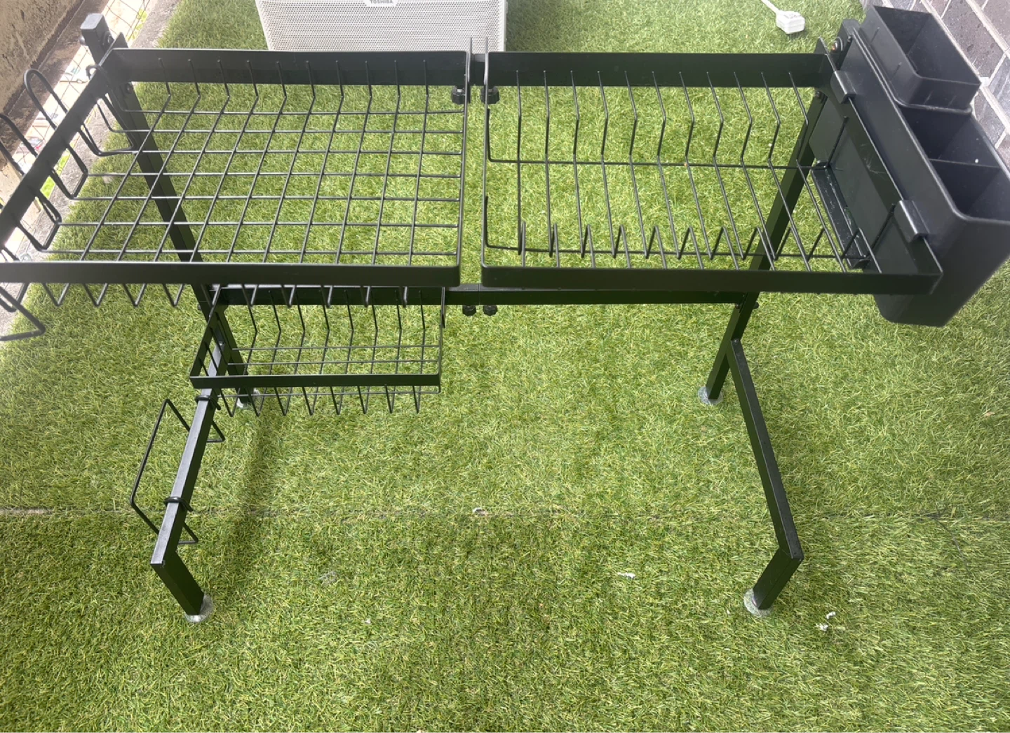 Black Metal Dish Drying Rack over the sink