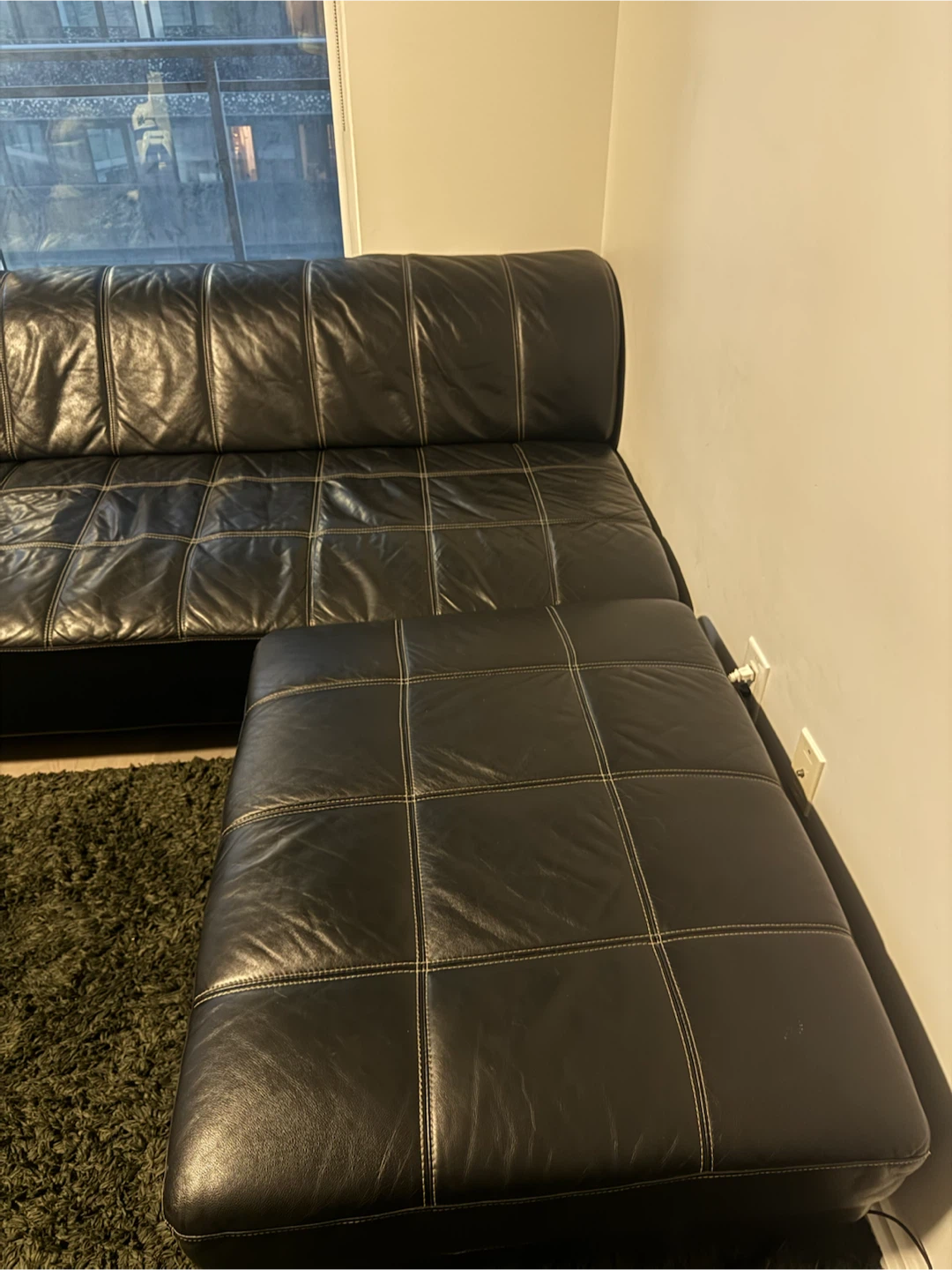 Black Leather Sectional Sofa with Ottoman