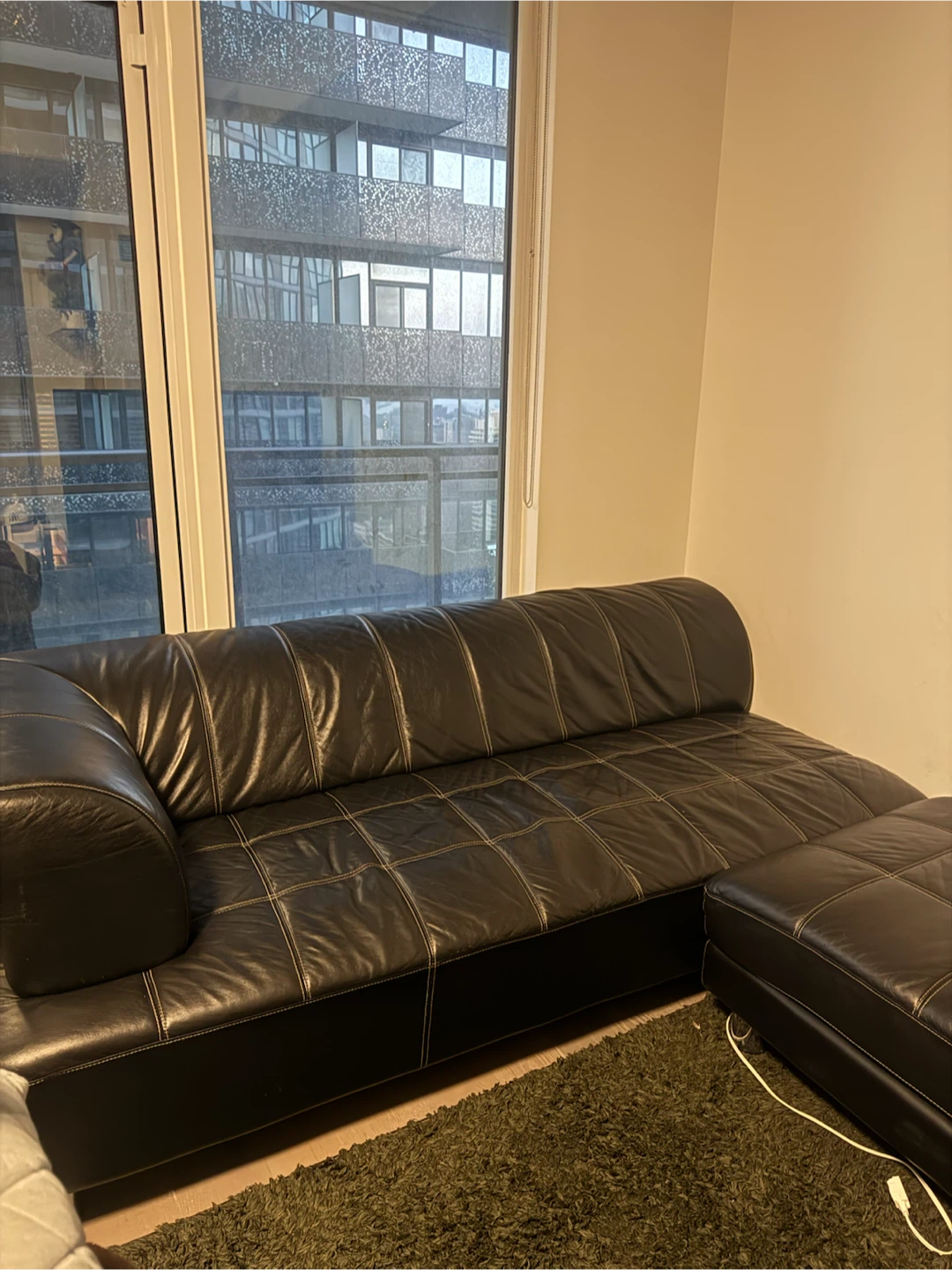 Black Leather Sectional Sofa with Ottoman - photo 2