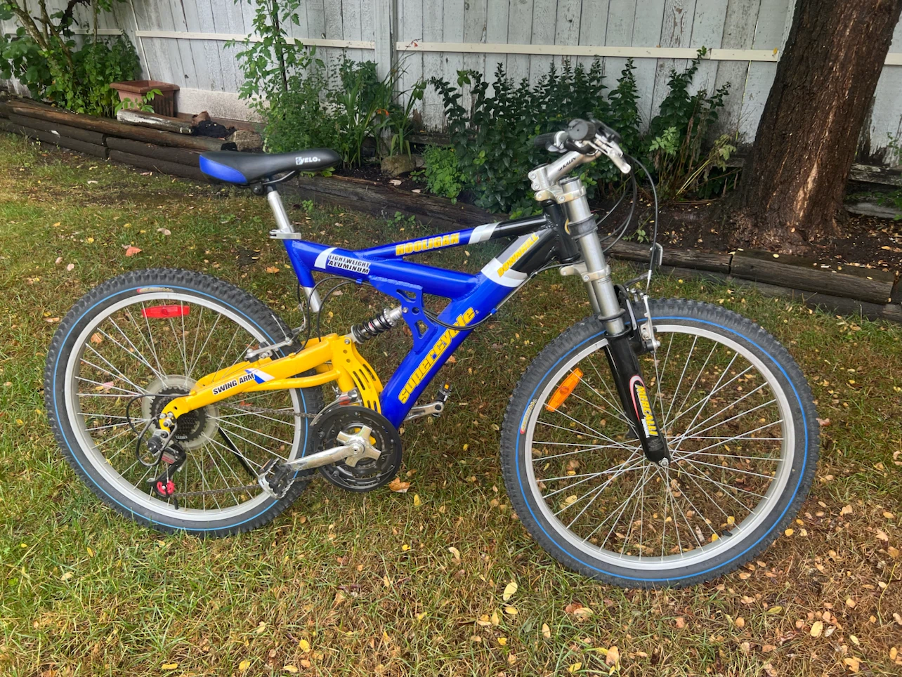Blue and Yellow Full Suspension Mountain Bike