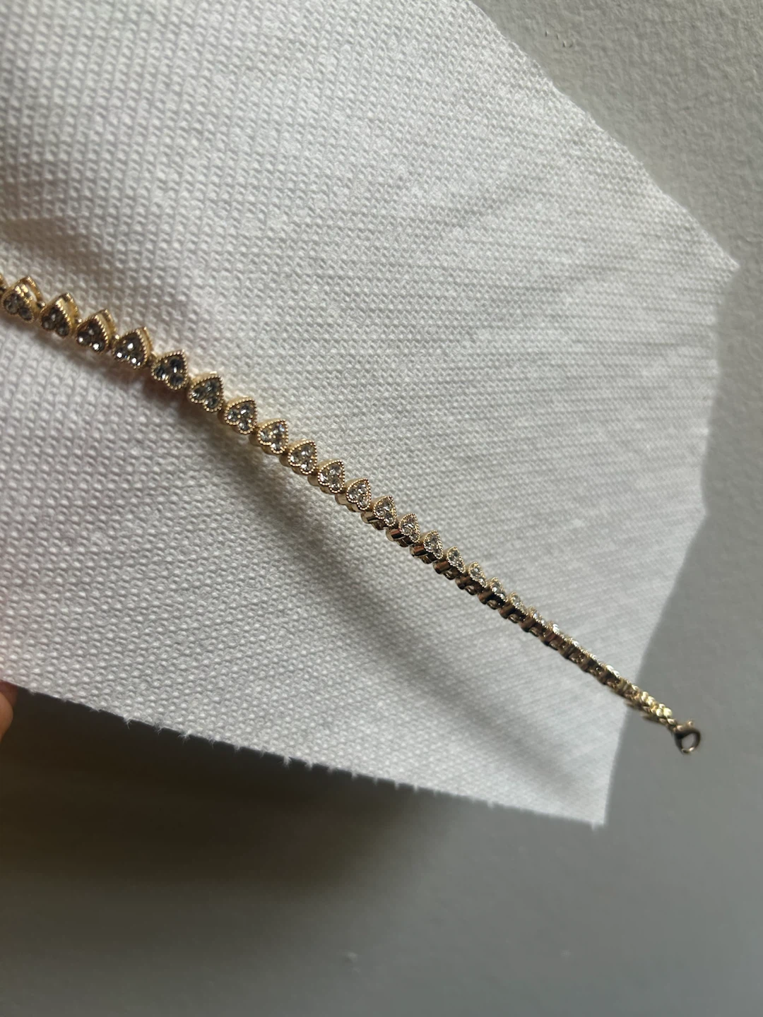 Gold-tone bracelet with heart-shaped charms