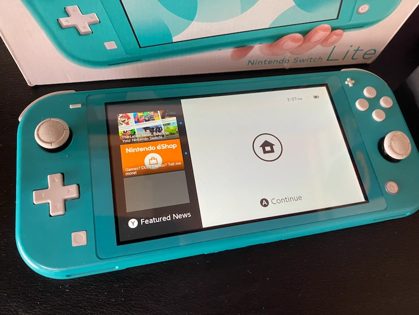 Nintendo switch Lite Turquoise - photo 2