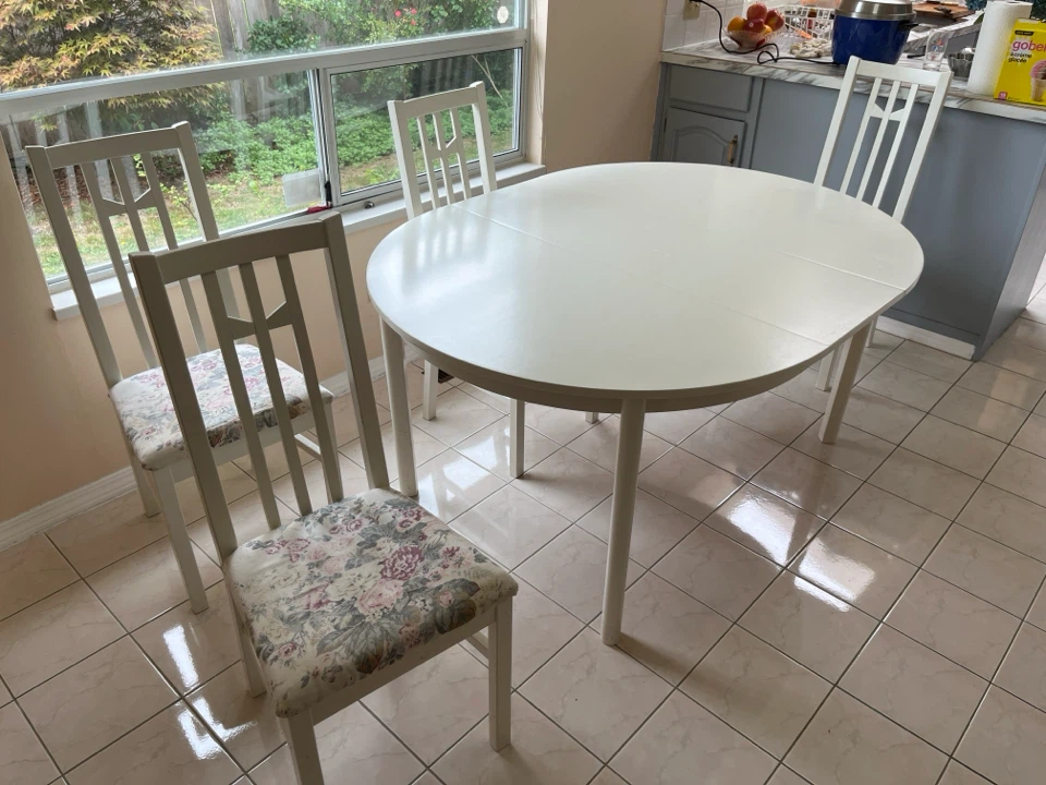 White Oval Dining Table with 4 Chairs