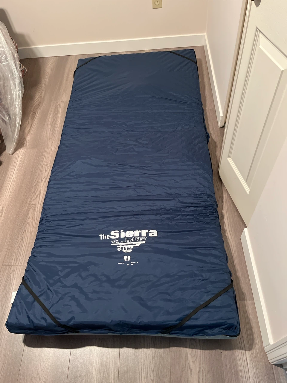 The Sierra Designs Self-Inflating Sleeping Pad