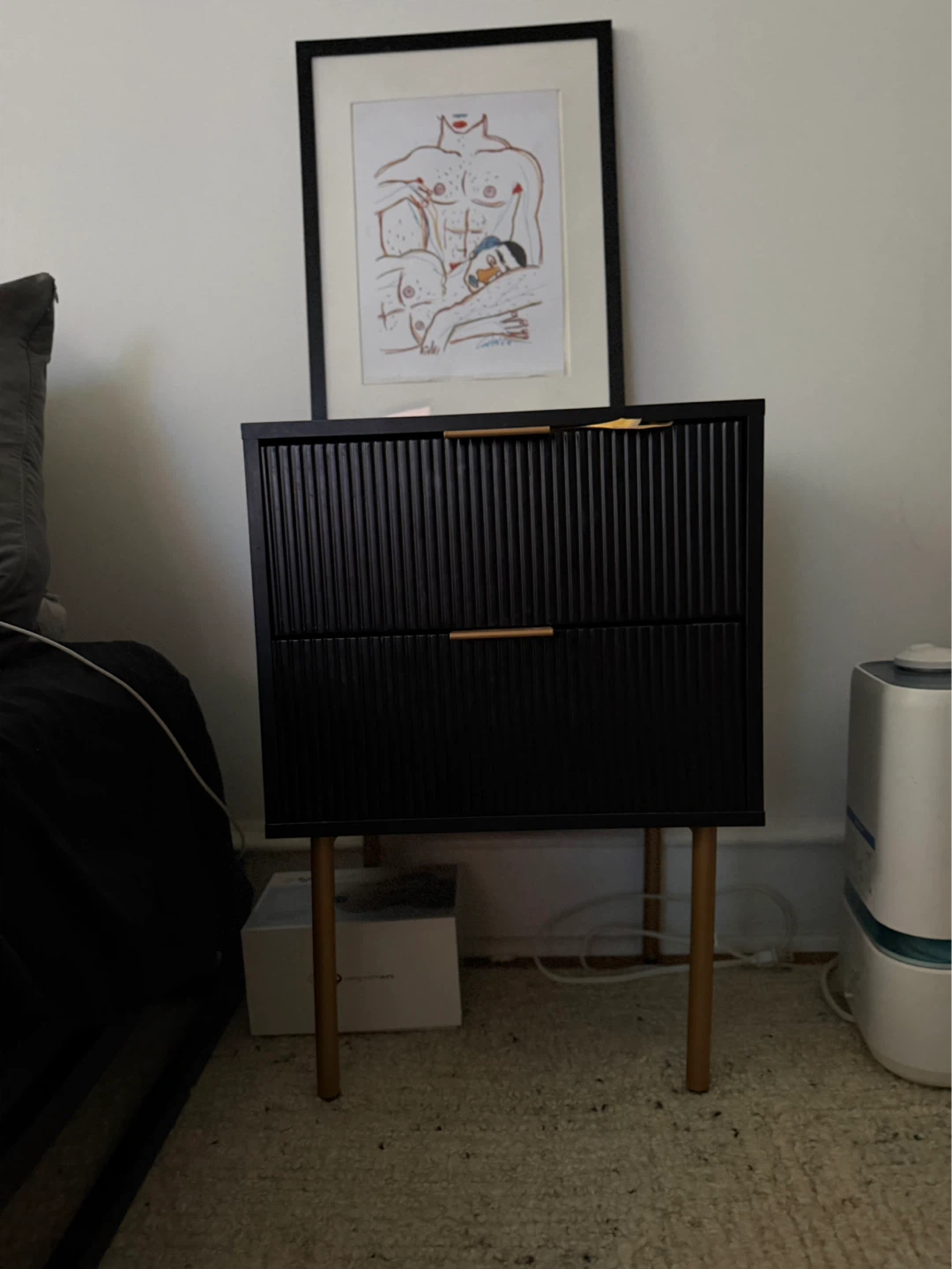 Modern mid-century inspired 2-drawer nightstand/accent cabinet.