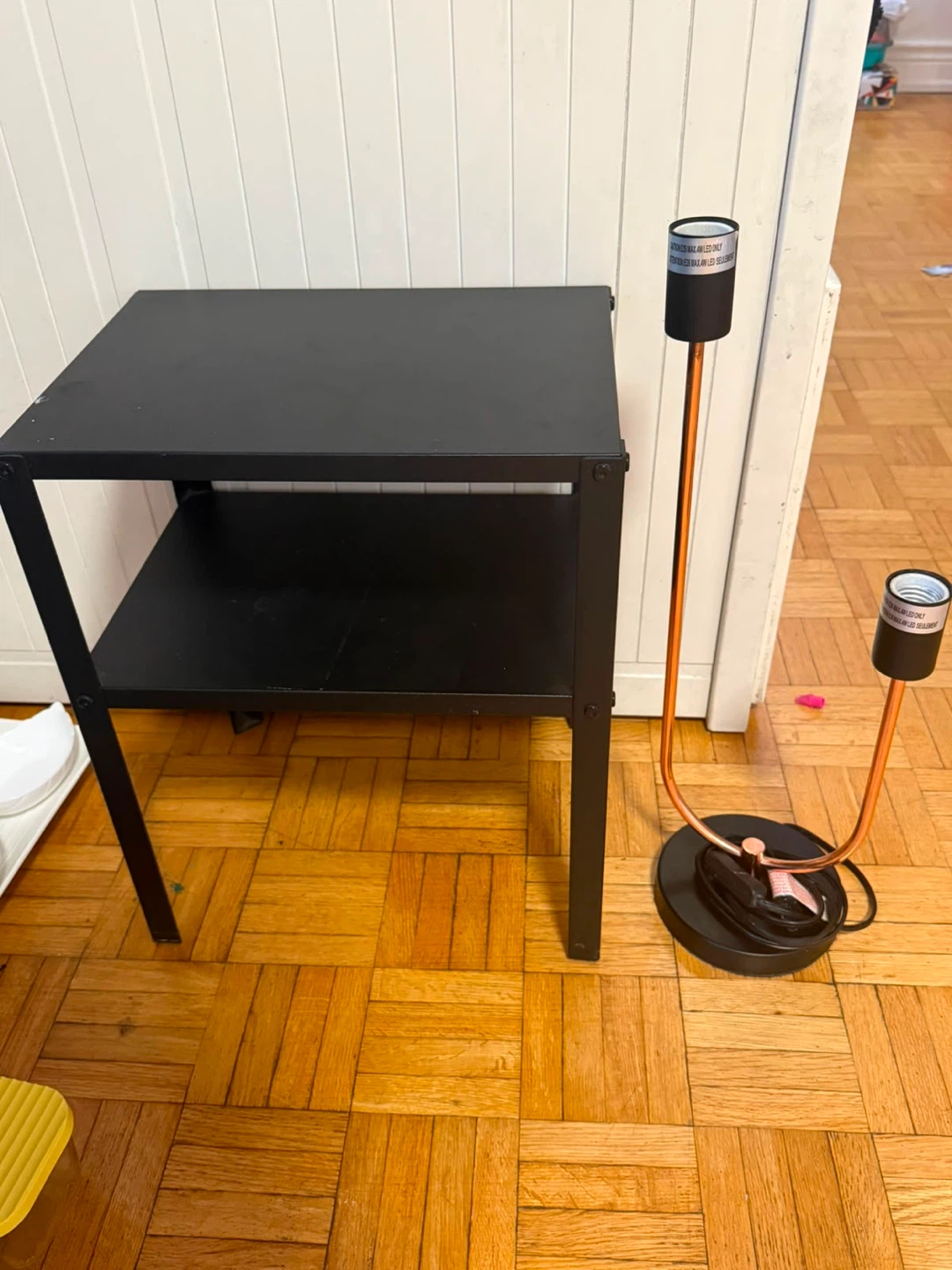Black metal side table and night lamp