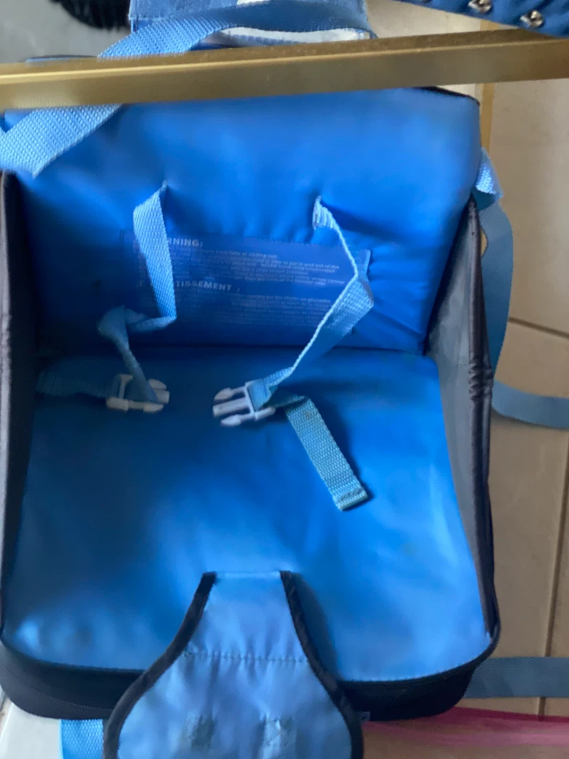 The First Years portable booster seat