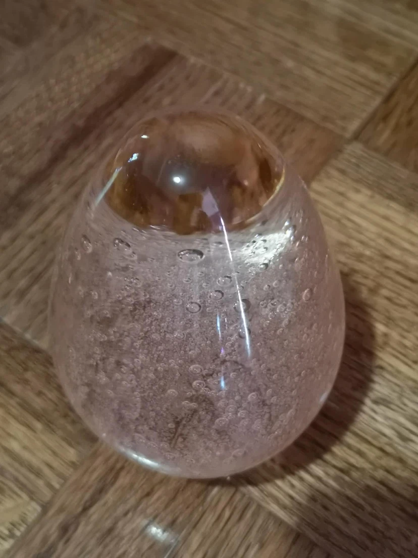 Glass egg paperweight with bubbles