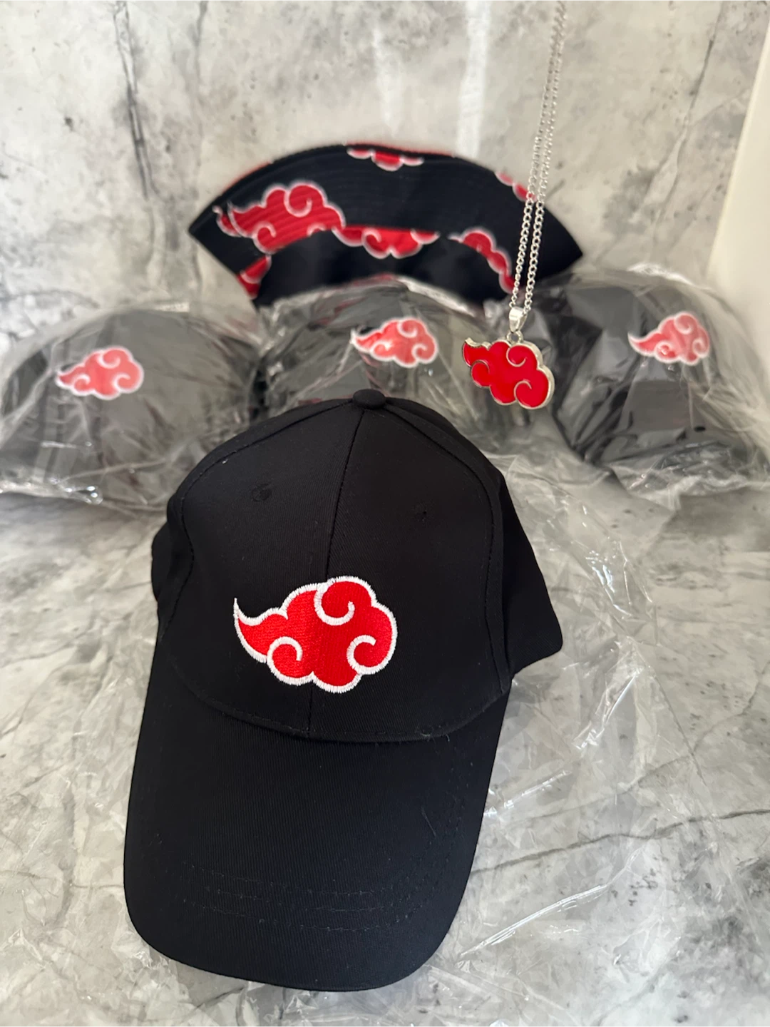 Black Baseball Cap with Red Cloud Design