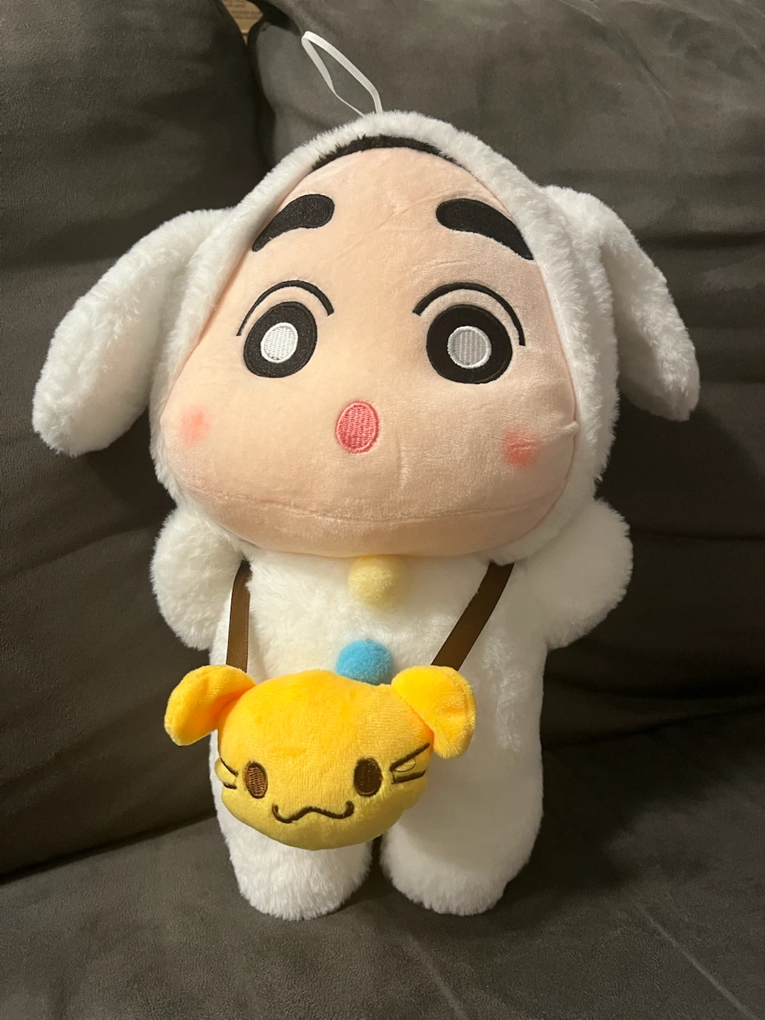 White Plush Toy with Yellow Bag
