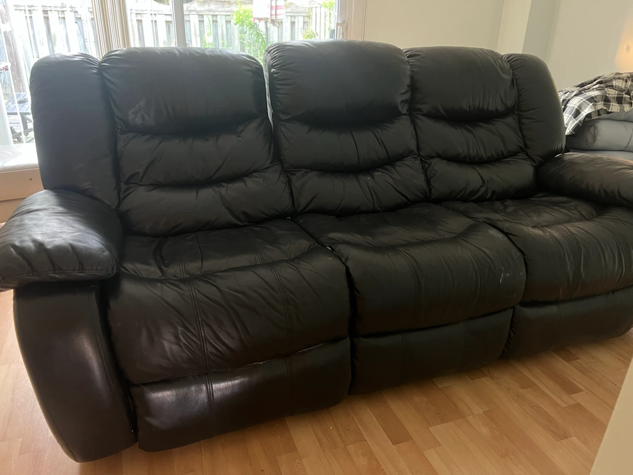Black Leather Reclining Sofa