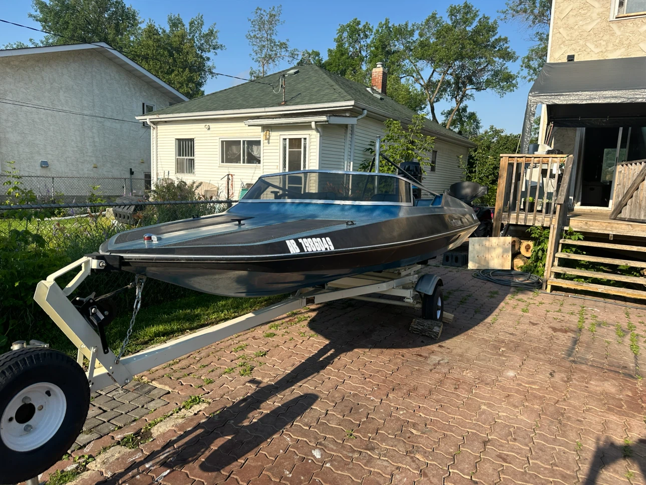 Blue Speed Boat with Mercury Outboard Motor