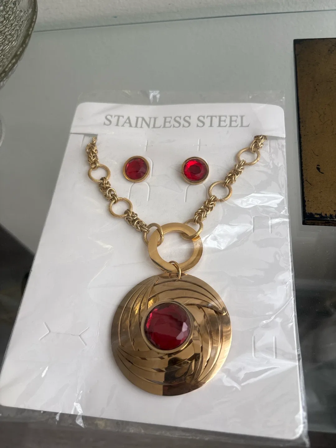 Goldtone Stainless Steel Necklace & Earring Set with Red Stones