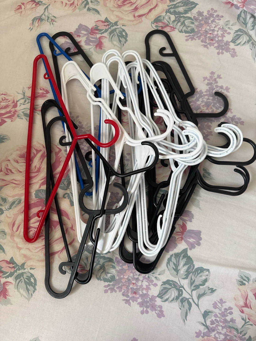 Assorted Plastic Hangers (Black, White, Red, Blue)