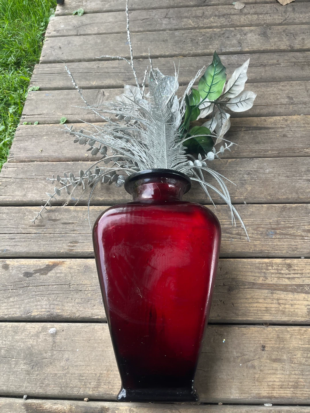 Dark Red Glass Vase with Decorative Picks