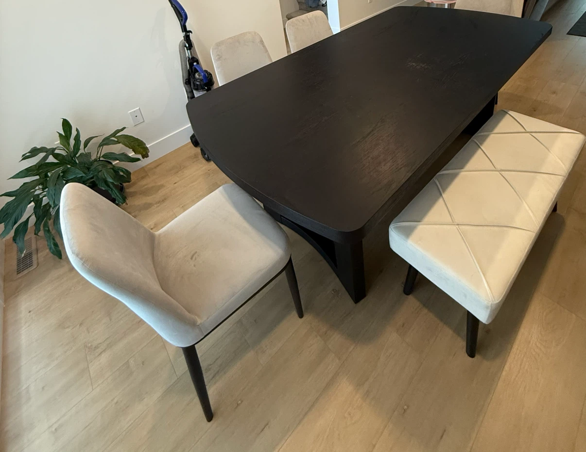 Black Dining Table with Cream Upholstered Chairs and Bench