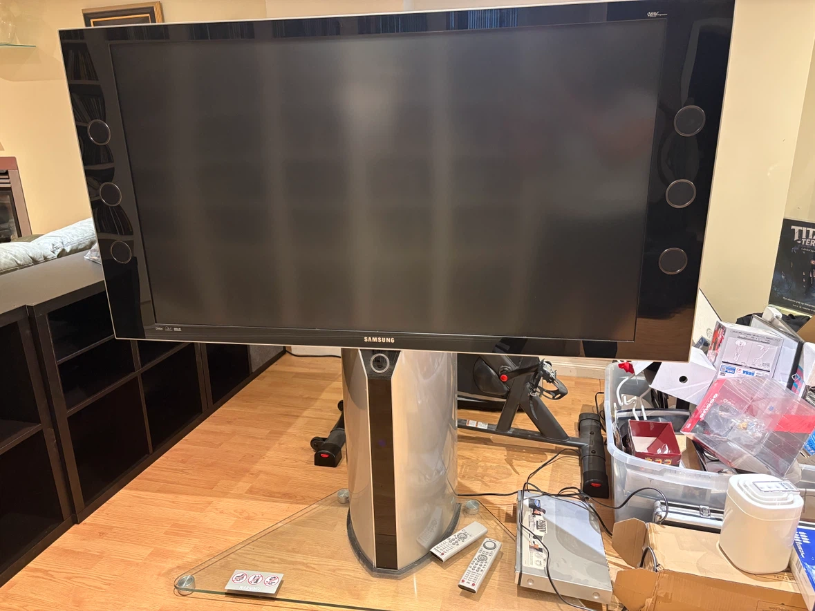 Samsung 56” HDTV with built-in pedestal stand