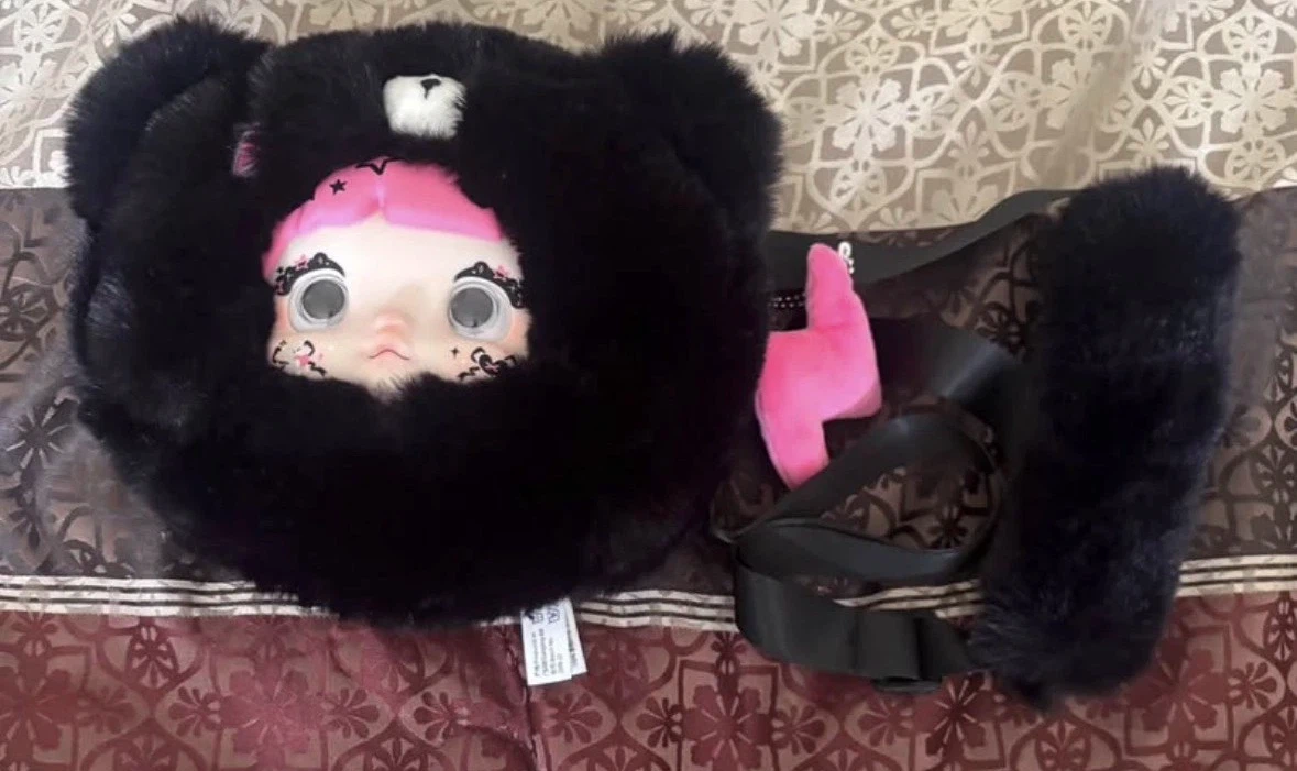 Nommi collecting cutie bag