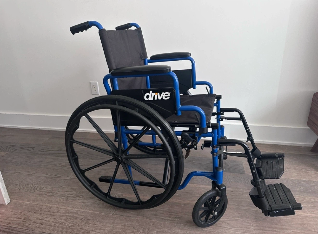 Blue and black Drive wheelchair