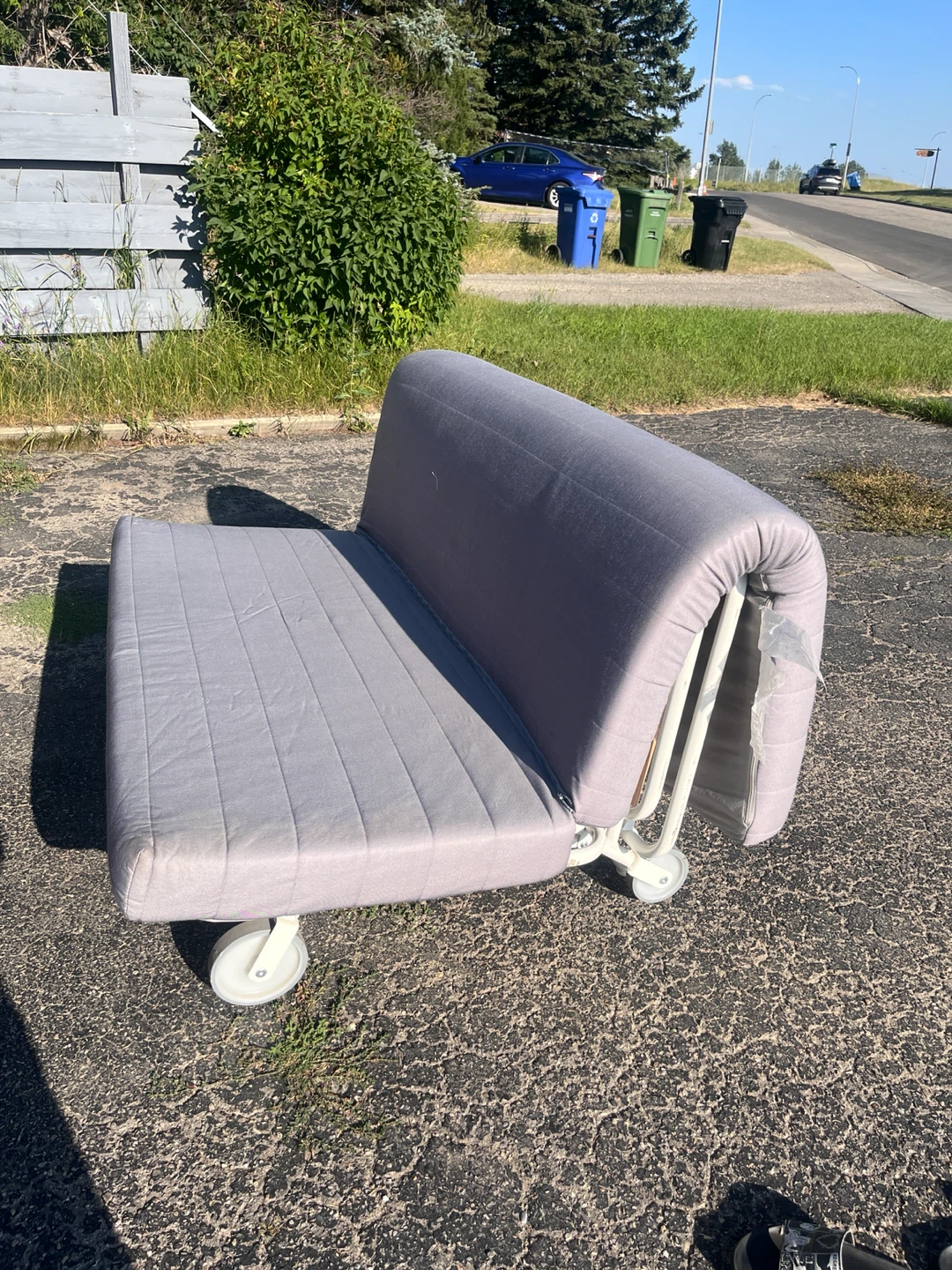 Grey Foldable Futon Chair/Bed with Wheels