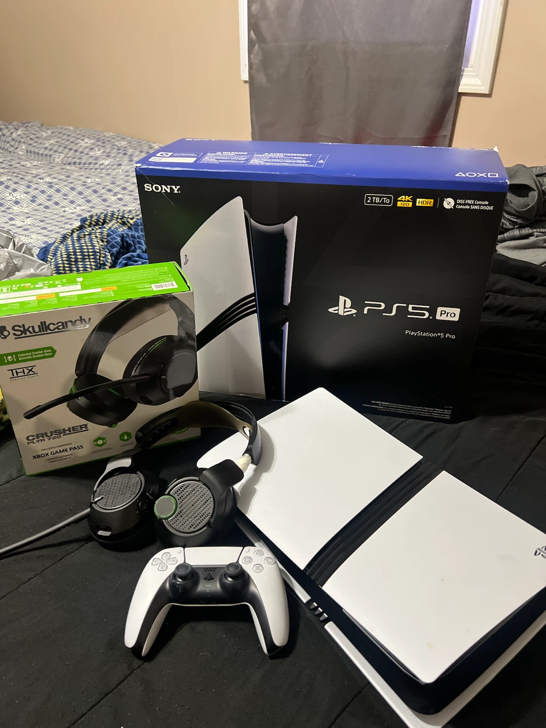 Sony PlayStation 5 Pro 2TB Console with Skullcandy Headphones