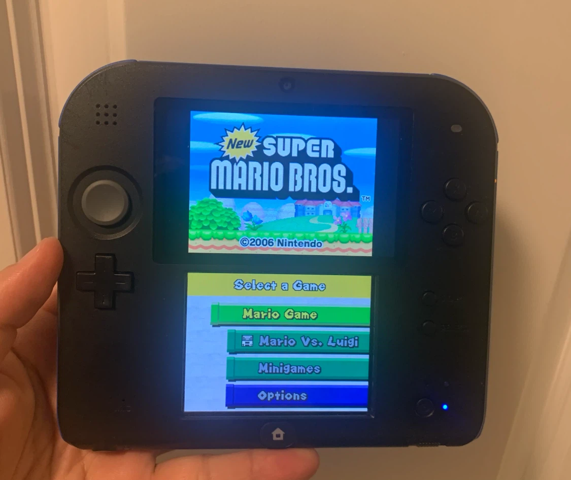 Nintendo 2DS XL with Super Mario Bros. Game and 4GB SD Card