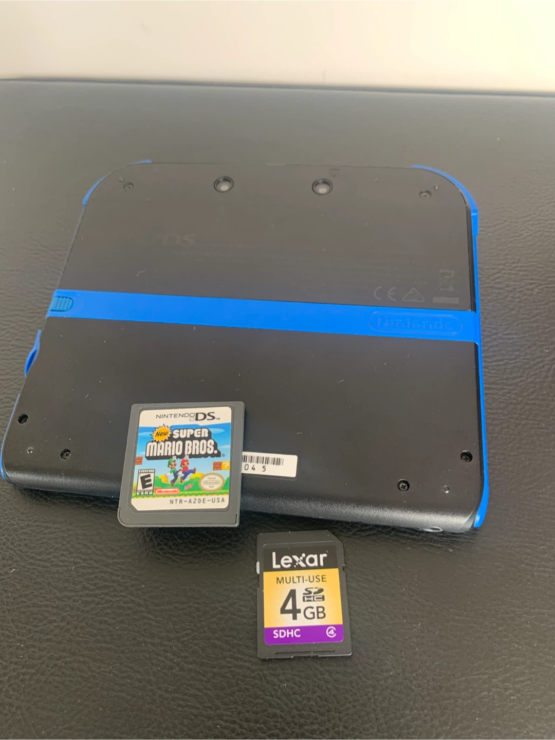 Nintendo 2DS XL with Super Mario Bros. Game and 4GB SD Card - photo 4