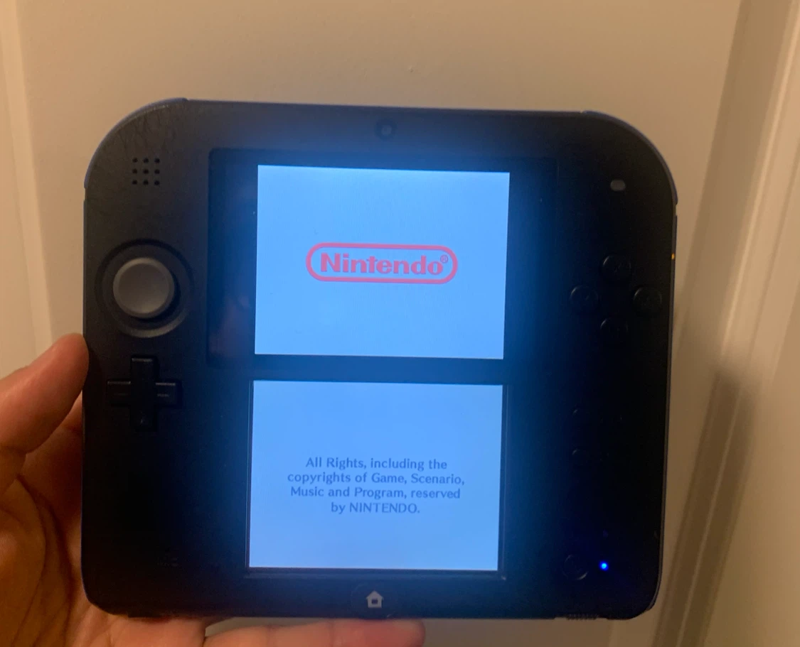 Nintendo 2DS XL with Super Mario Bros. Game and 4GB SD Card - photo 5