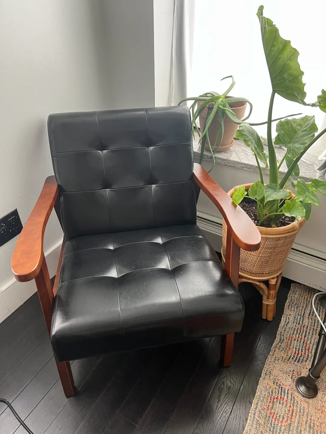Black Armchair with Wooden Frame