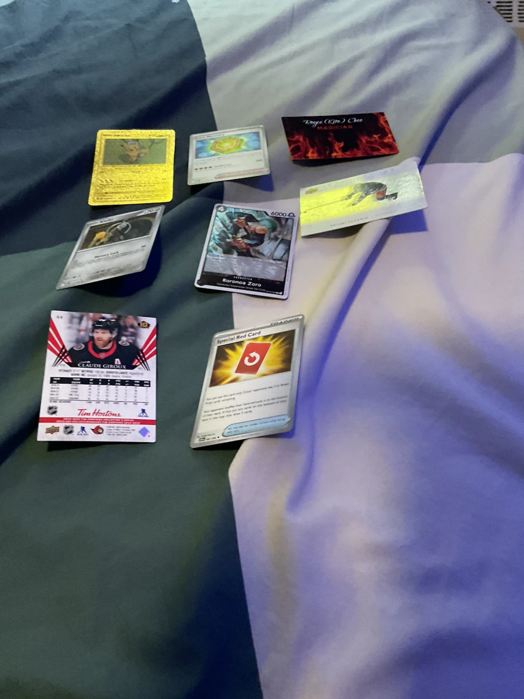 Assorted Trading Cards:Pokemon Gold Card, Roronoa Zoro