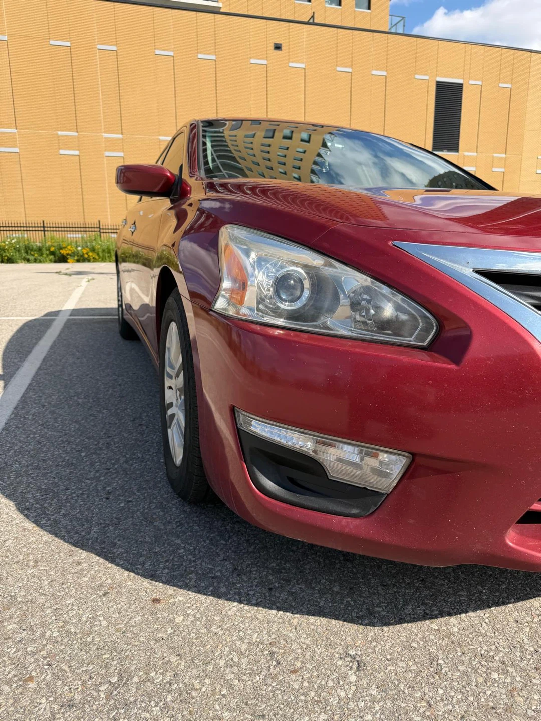 Red Nissan Altima Sedan