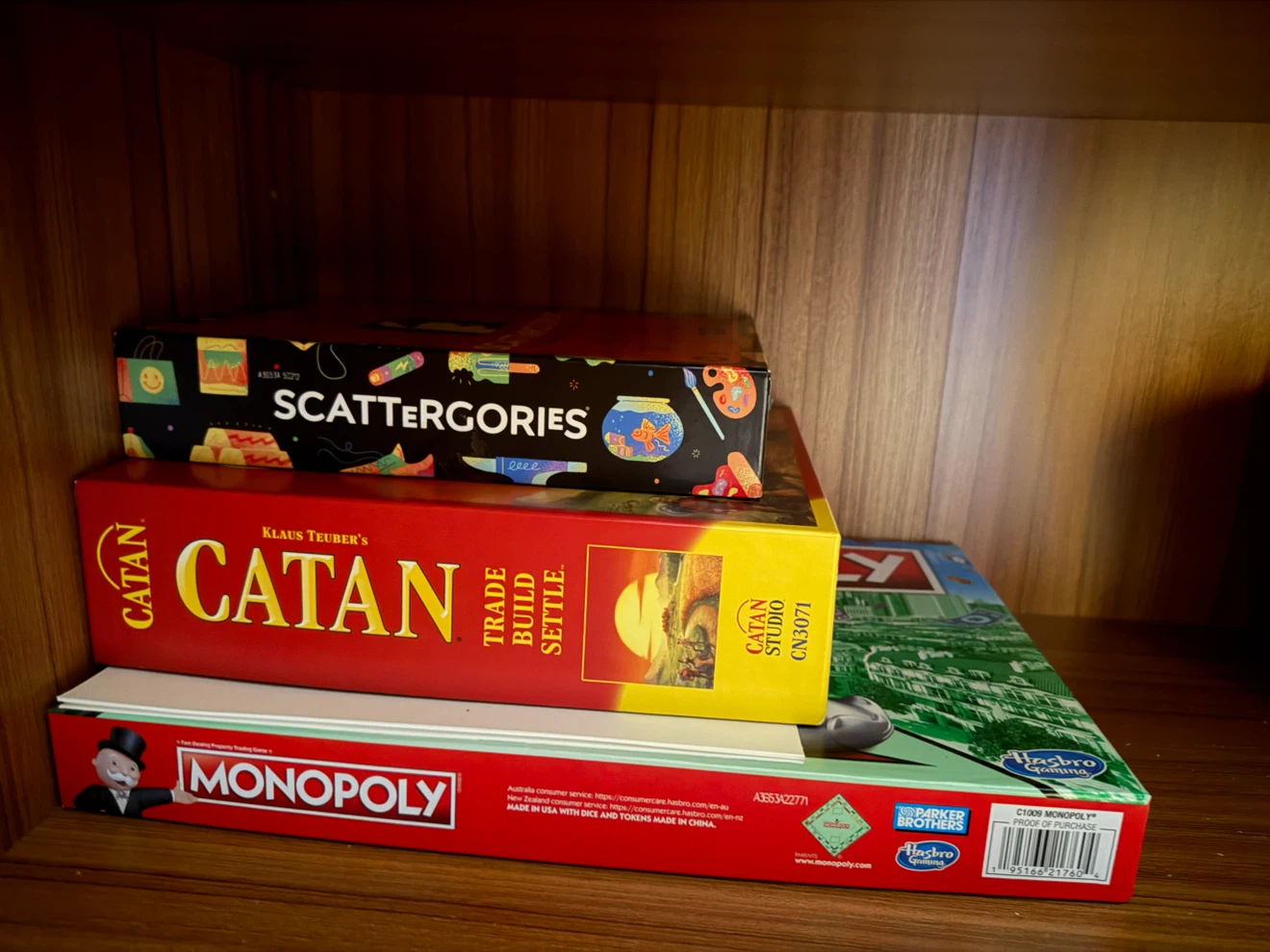 Monopoly, Catan, and Scattergories Board Games