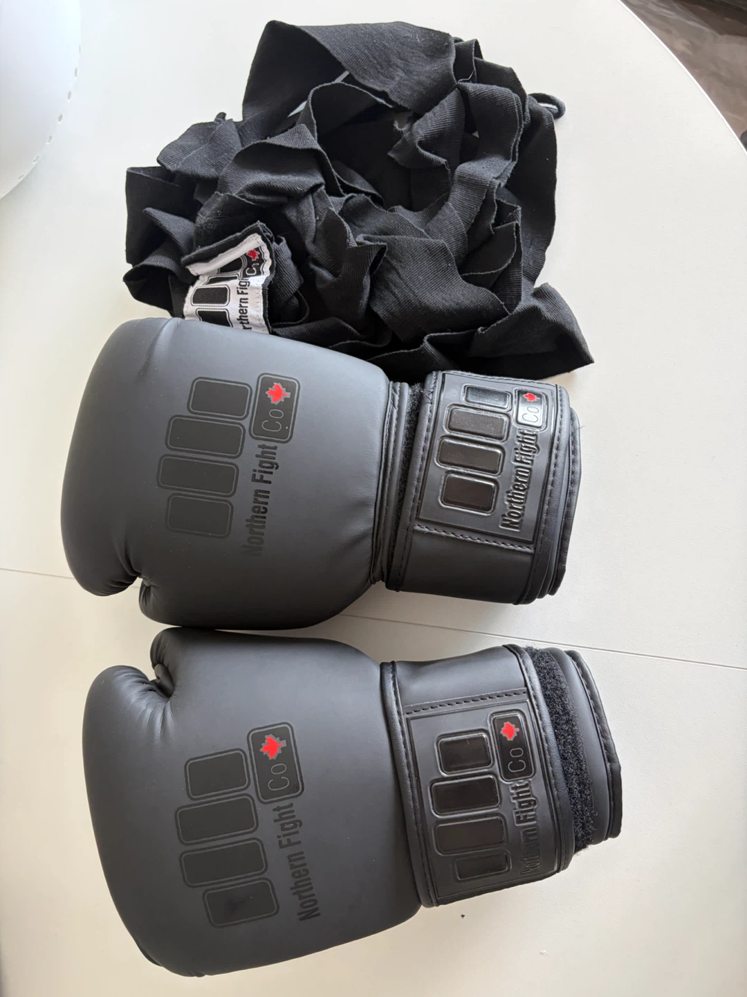 Boxing gloves with bindings