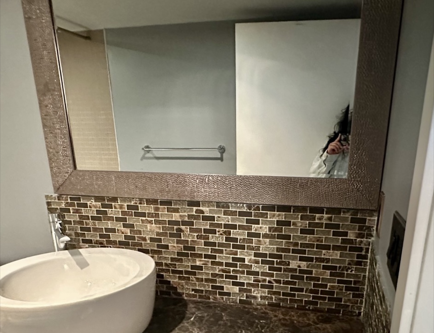 Metal framed bathroom mirror