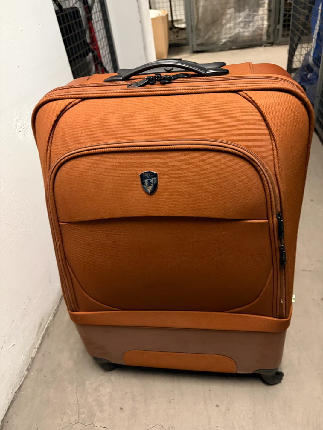 Orange Spinner Luggage