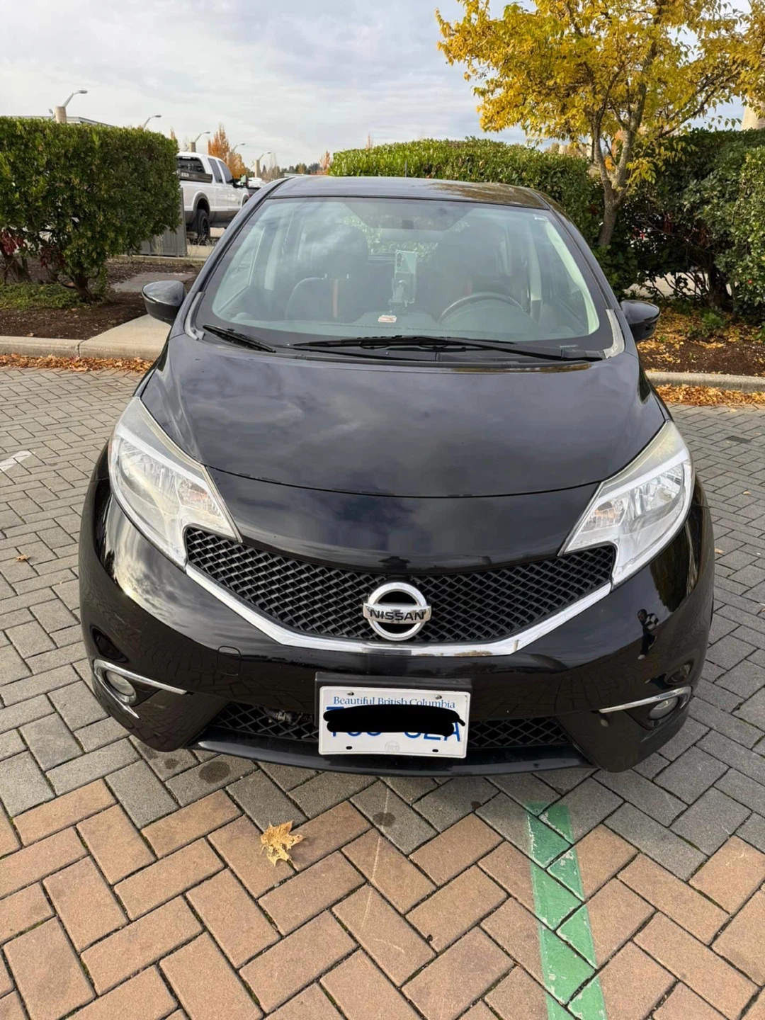 Black Nissan Versa SR Hatchback