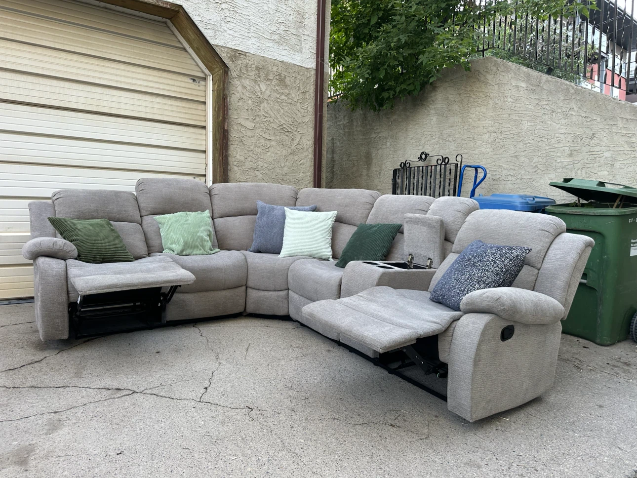 Leon’s Light Grey Reclining Sectional - photo 3