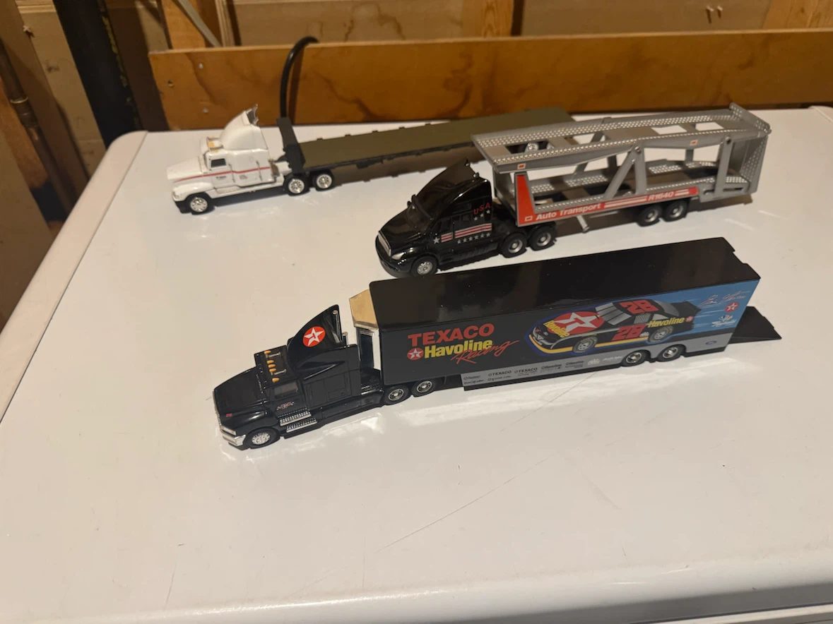 3 Diecast Semi Trucks and Trailers. 1/64th scale. $20 each