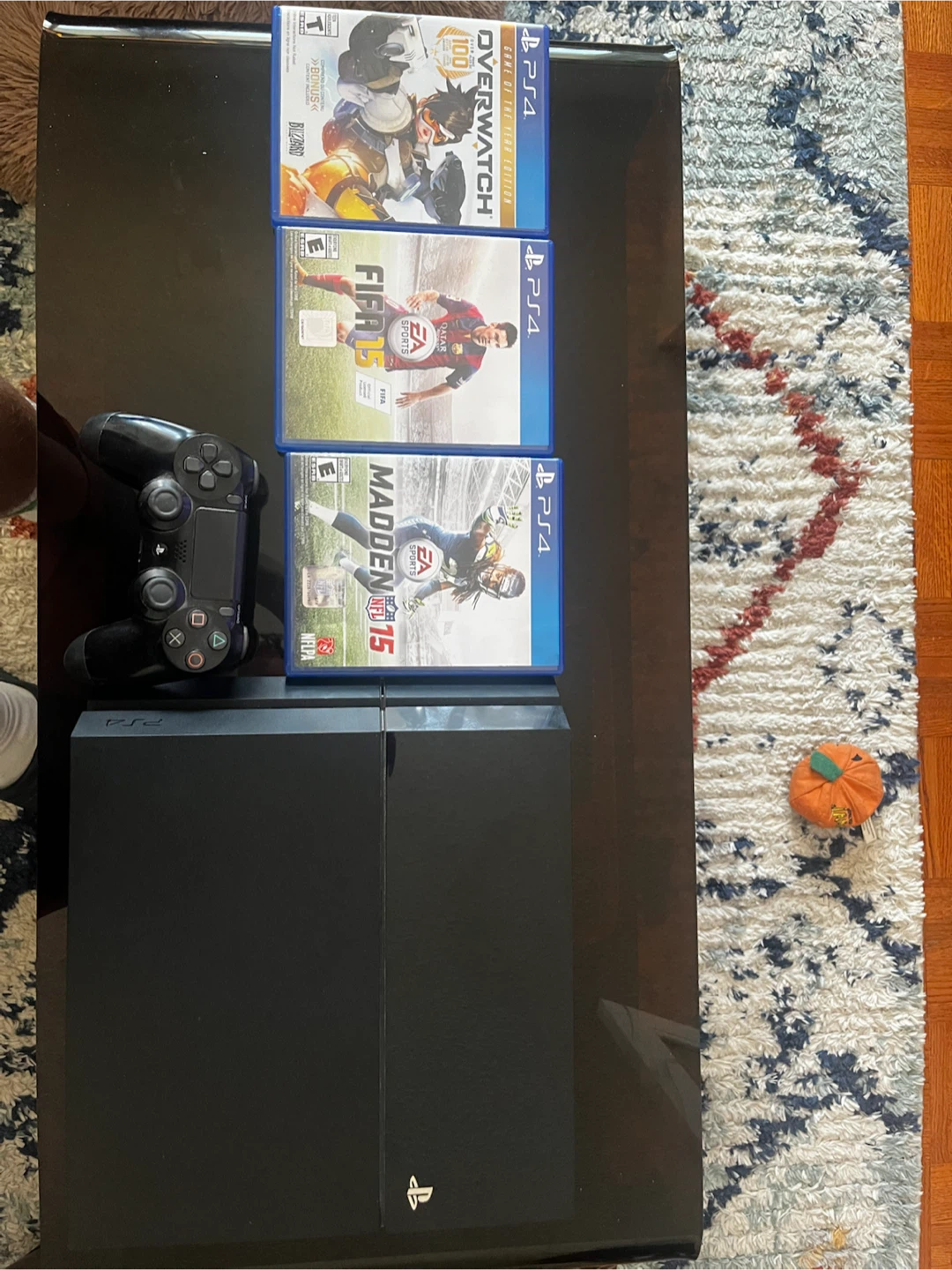 PS4 Console with Overwatch, FIFA 15, and Madden 15