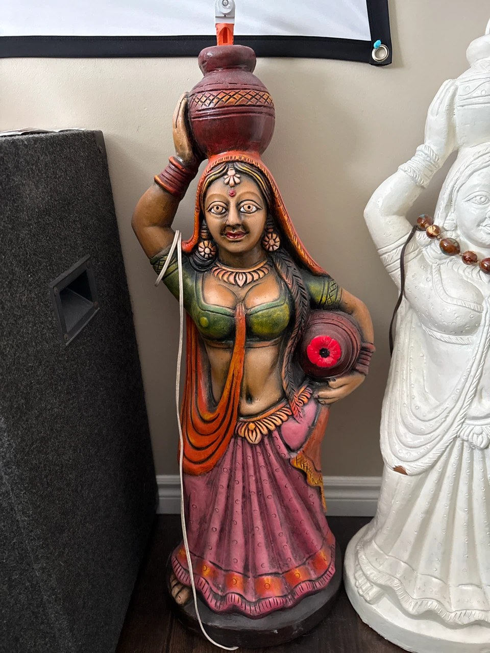 Decorative Figurine of a Woman Carrying a Pot