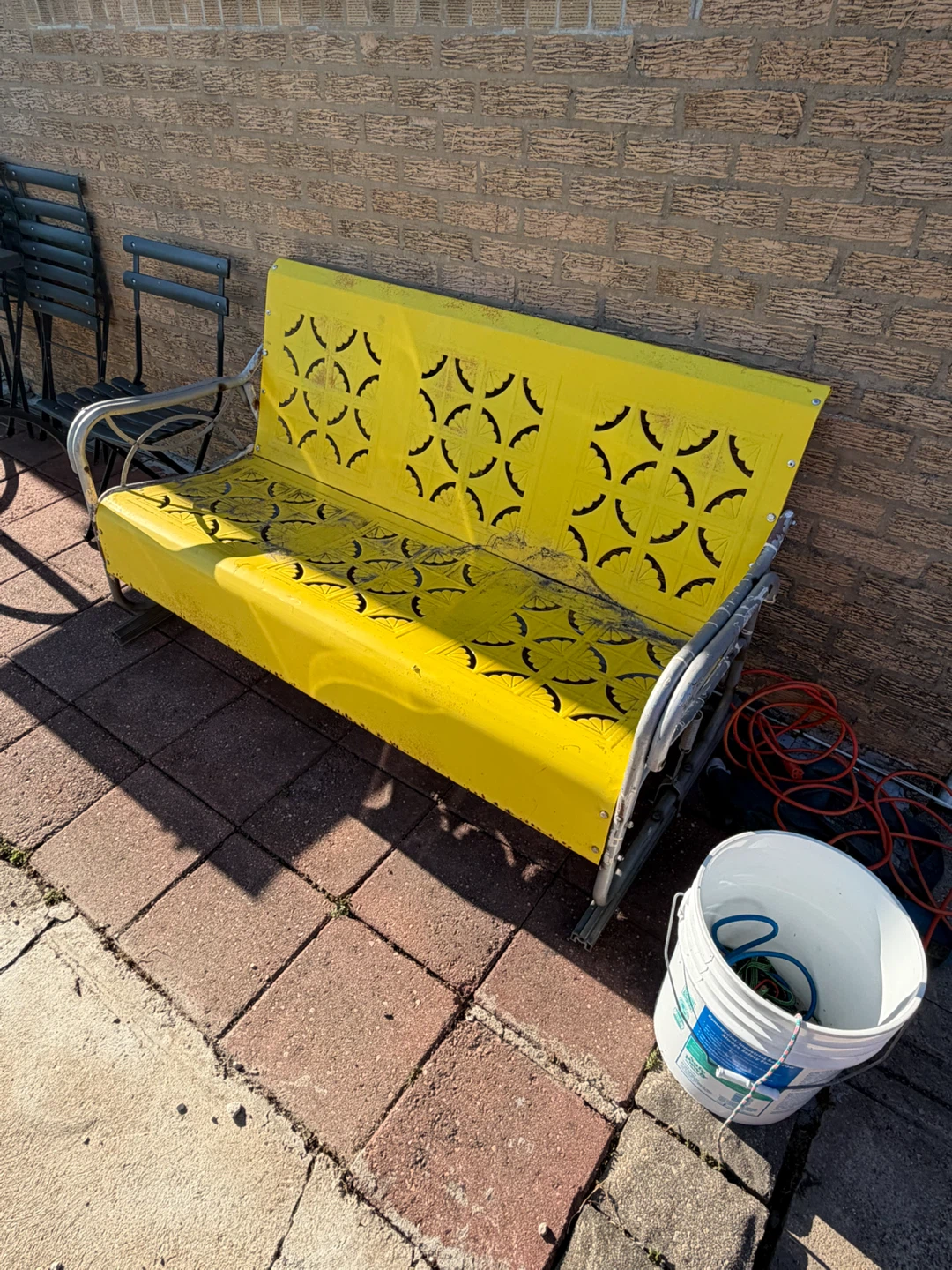 Yellow Metal Glider Bench