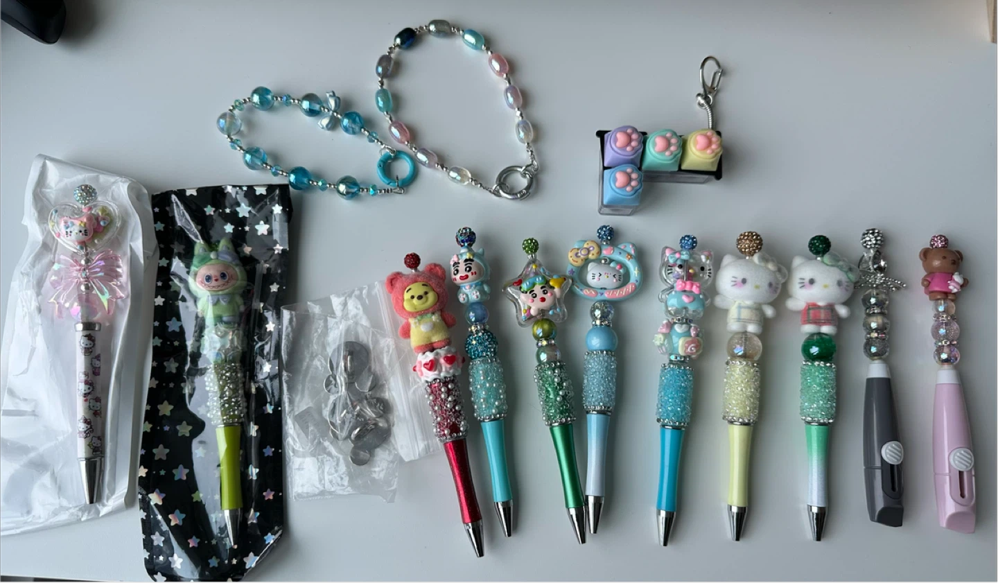 Assorted Decorative Pens & Bracelet
