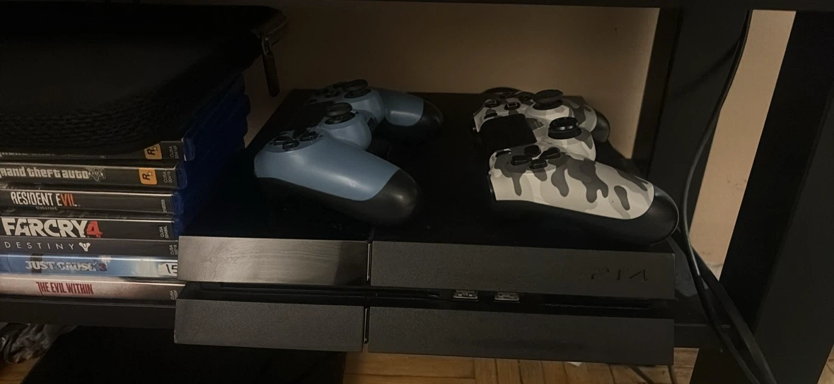 Sony PlayStation 4 Console with 2 Controllers & 12 games