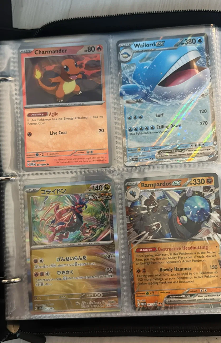 Filled Pokémon card binder