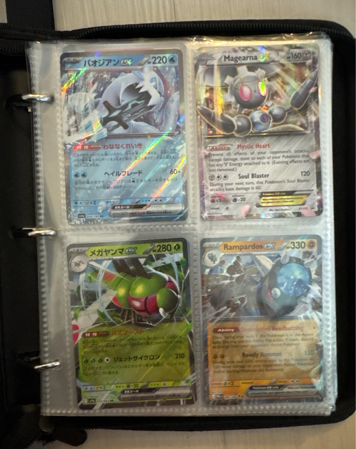 Filled Pokémon card binder